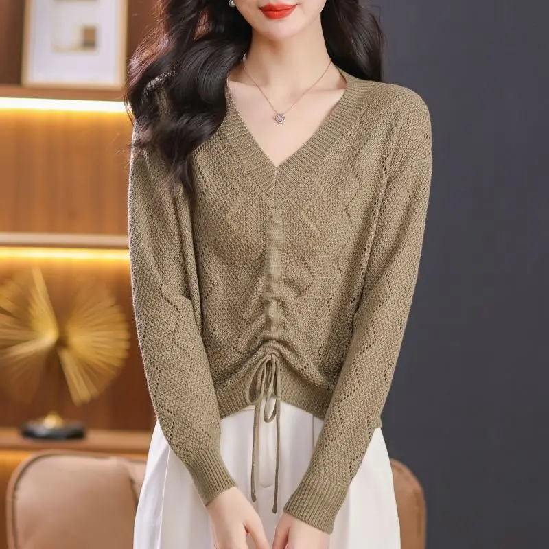 

2024 Spring and Autumn Korean Fashion Commuter Loose and Versatile Knitted Solid Color Long Sleeved V-neck Hollow Women's Top