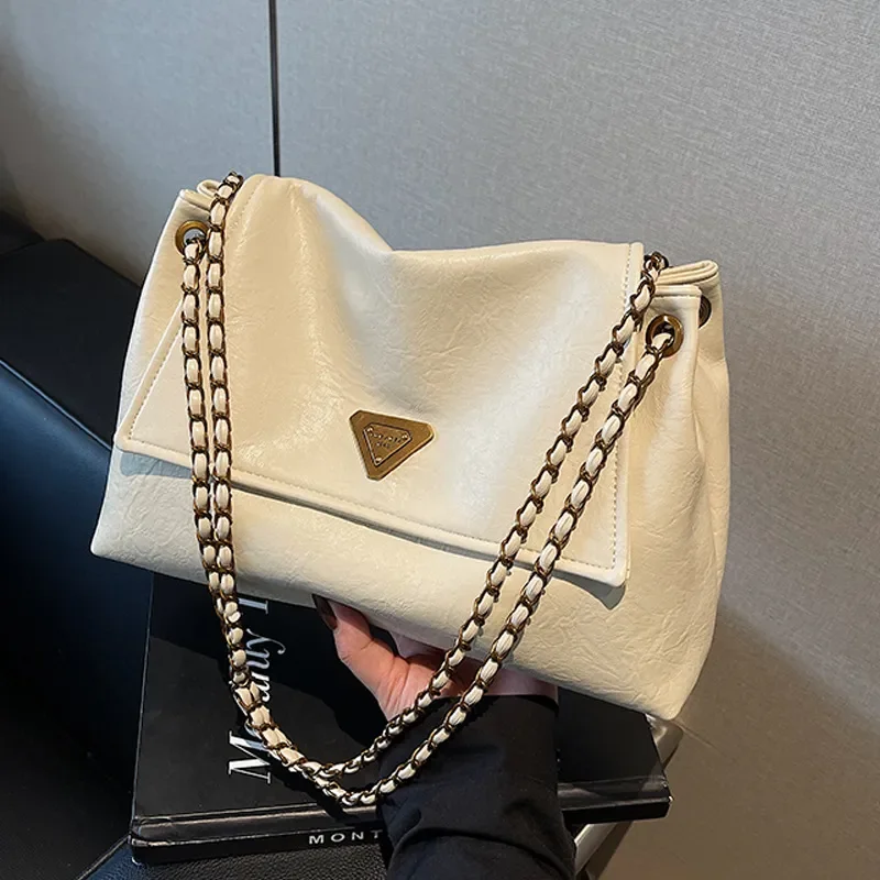 Hot new free shipping designer bags for womens Popular shoulder bag black white brown New Fashion Versatile Bag