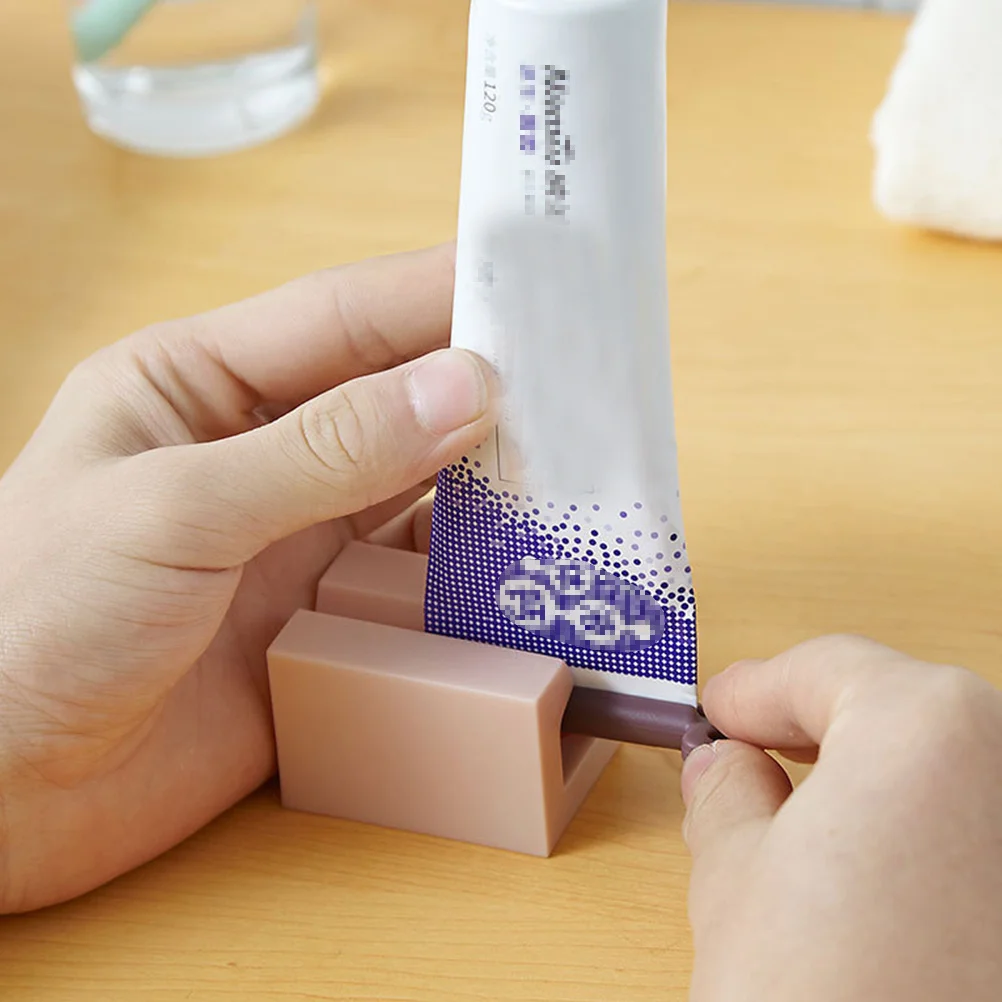 

4Pcs Plastic Toothpaste Tube Squeezer Durable Desktop Handheld Dispenser for Home Kids Bathroom White Pink Dark Blue Light Blue