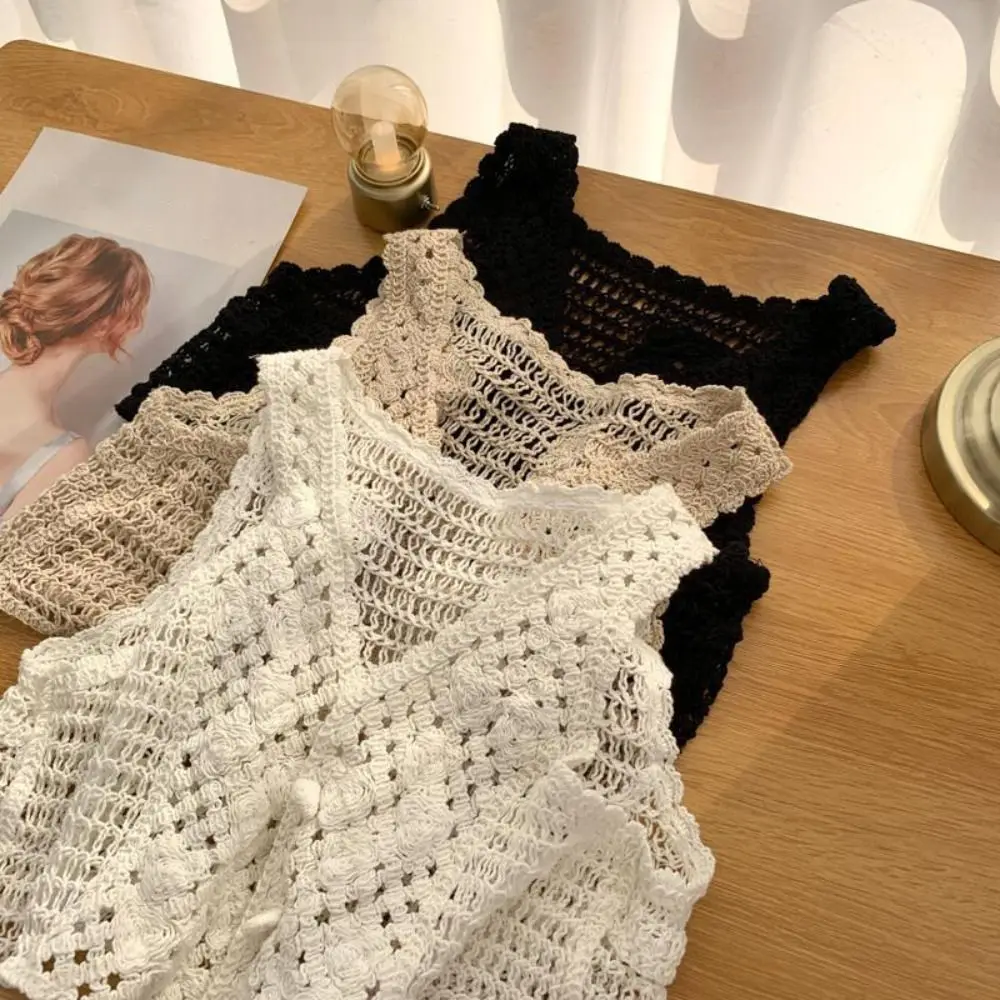 Vintage Hollow Out rompi Crochet Tank top Crop tanpa lengan kain pantai kancing kardigan Chic rajut atasan kasual wanita