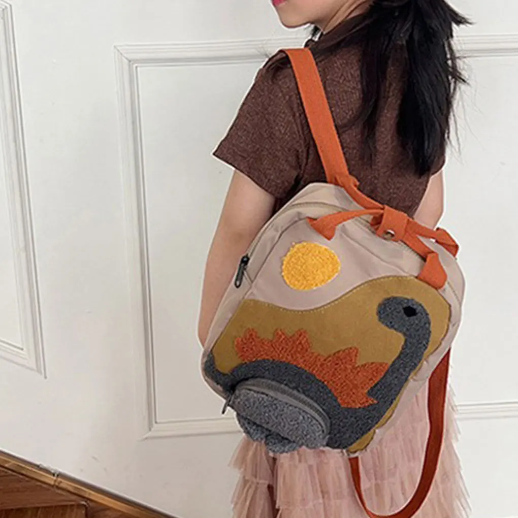 2025 New Embroidery Sun Long Neck Small Dinosaur Backpack Hook Hair Embroidered Cartoon Canvas Kindergarten Children Backpack