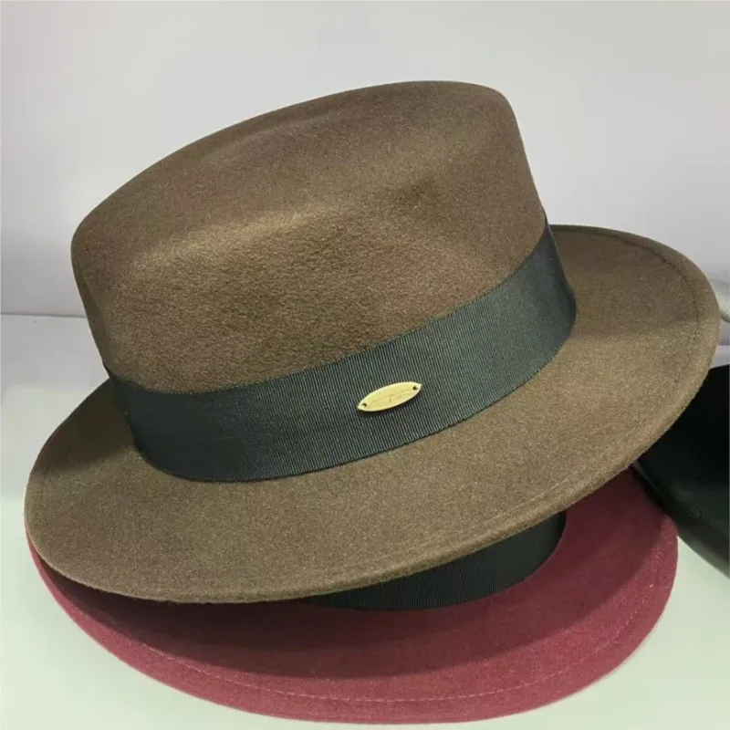 

The new flat-topped woolen top hat is a versatile and fashionable choice for women in autumn winter wide-brimmed simple elegant