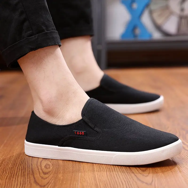 Sepatu pantofel pria, sneaker Slip-ON olahraga tenis kasual mewah untuk pria tren 2024 kanvas nyaman berjalan luar ruangan