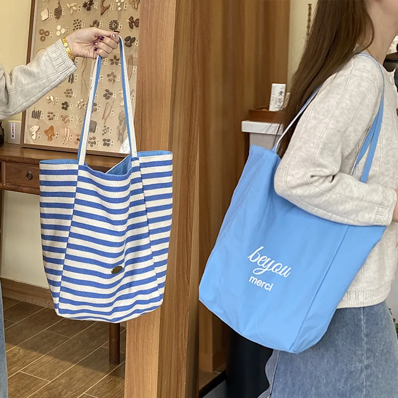

Navy Blue Canvas Tote Bag with Double-Sided Stripes Ins Fashion Large Capacity Shoulder Crossbody Bag for Commute Travel School