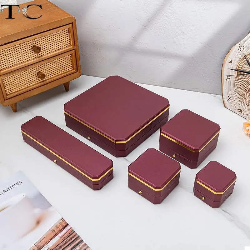 Octagonal PU Leather Jewelry Box Set for Rings Necklaces Bracelets and Pendants Red and Green with Gold Trim Business Style
