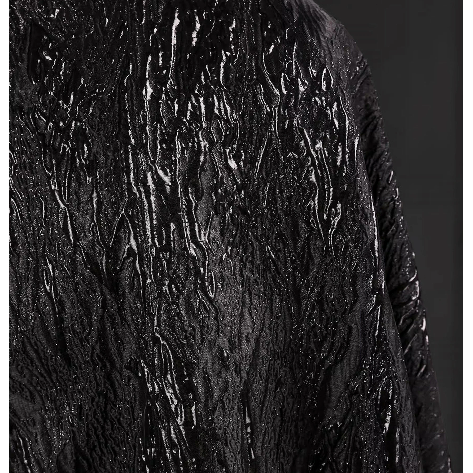 Pure black undulating vein gilt jacquard fabric texture gloss stiff coat creative clothing designer fabric