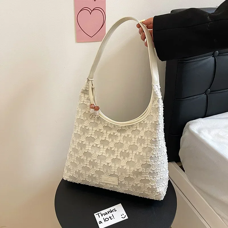 

2025 Large Capacity Commuting Tote Bag for Women Trendy Armpit Bag | Versatile Niche Casual Shoulder Handbag with Stylish Design