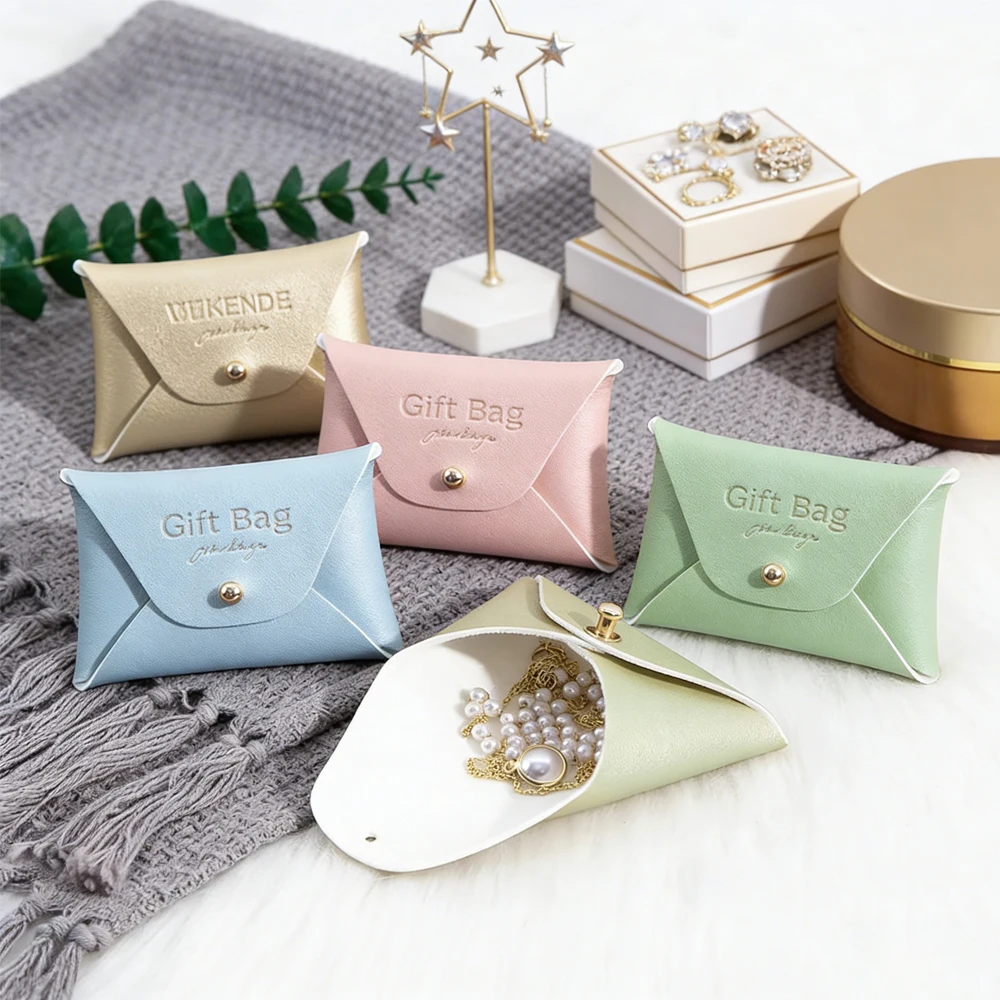 

100 шт. подарочных мешочков для украшений 7x5см, 10x7см из искусственной кожи с заклепками, сумки-футляры для хранения ожерелий, колец, браслетов