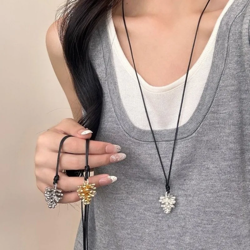 Metal Pine Cone Pendant Necklace Adjustable Black Cord Pull Design Niche Versatile Long Sweater Chain Statement Jewelry Gift