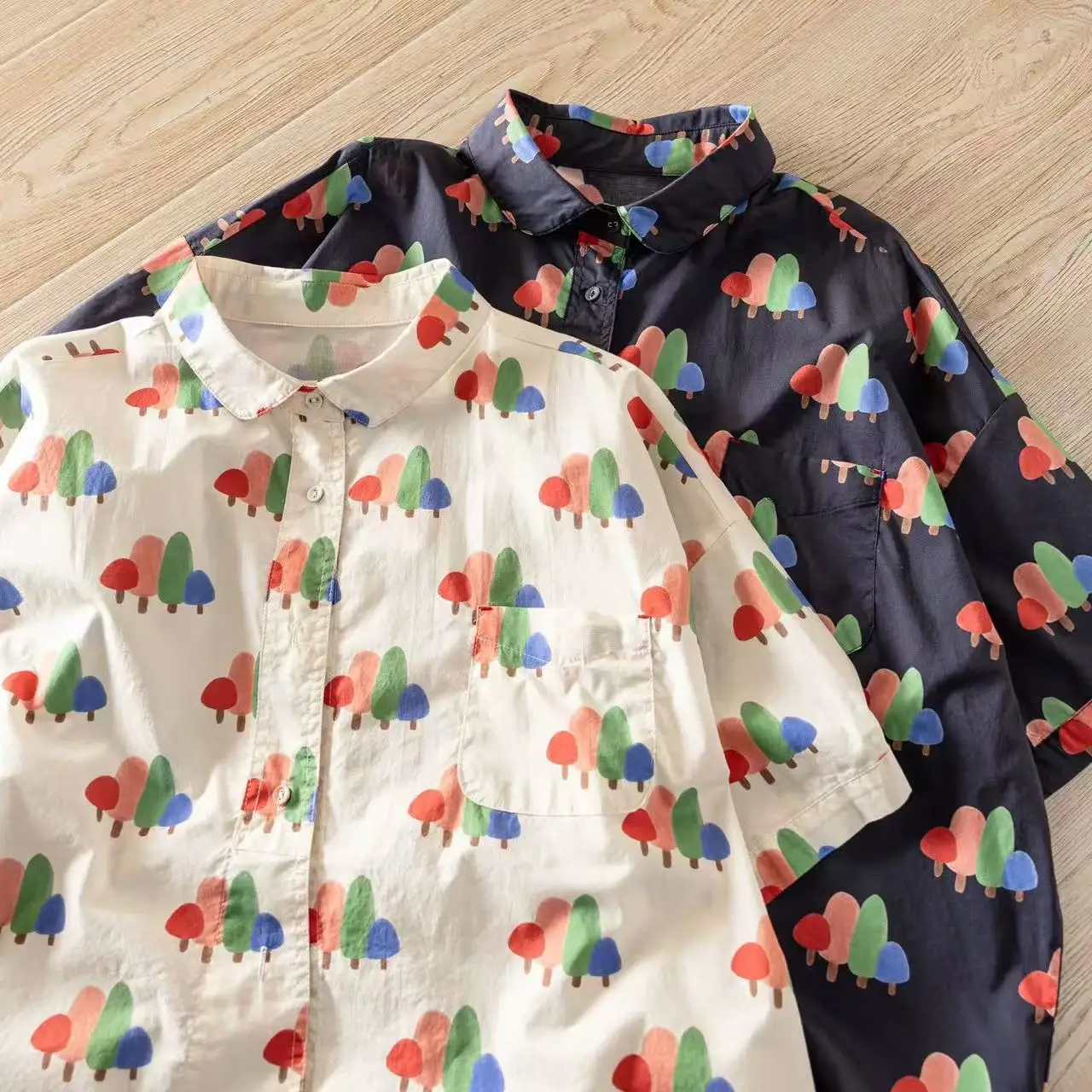 

2026 Harajuku fashion white navy blue cartoon tree print shirts short sleeve blouses women summer pure cotton oversized shirts