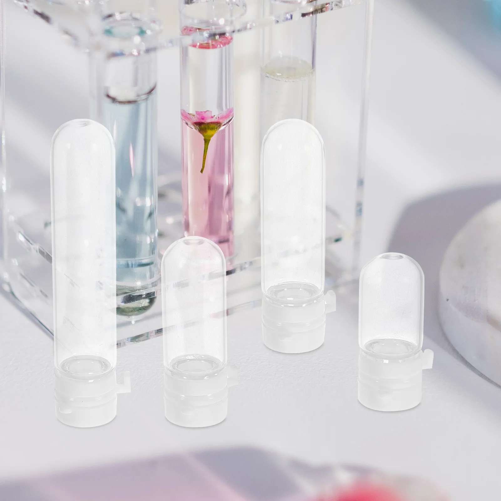 

20Pcs Glass Lotion Dispensers Refillable Small Tubes with Caps for Essential Oils Serums Travel Size Liquid Container