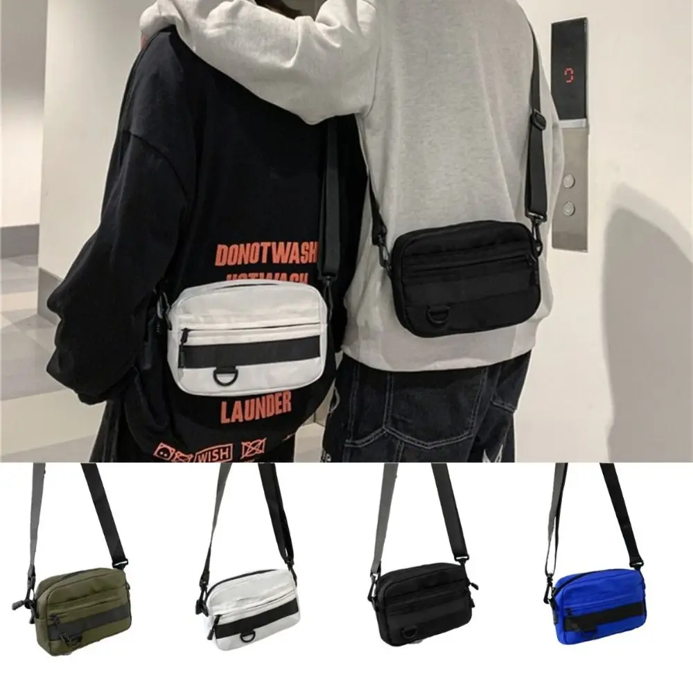 Bolsos cruzados informales ligeros para hombre, bolso deportivo portátil de estilo japonés para teléfono, bandolera de nailon con cremallera de Color sólido, Unisex