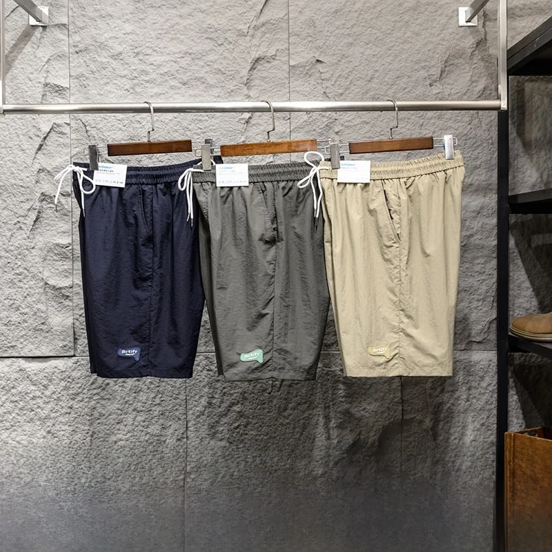 Men's Lightweight Breathable Quick-Drying Waterproof Five-Quarter Short Sports Shorts Fashionable Urban Style Straight Leg Ca...