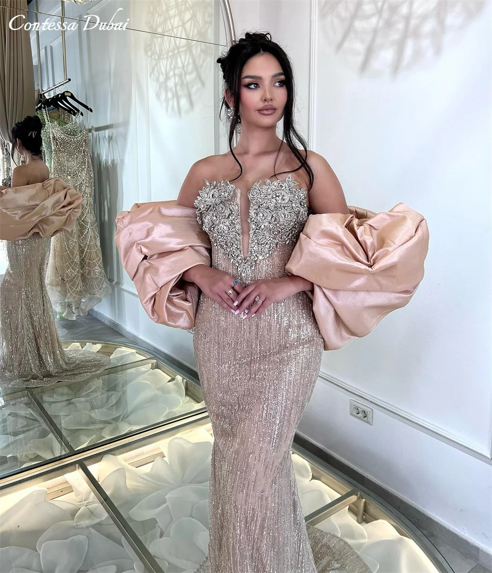 فستان كونتيسا دبي مخصص للحفلات الراقصة باللون الأبيض قبالة الكتف مطرز بالخرز فيستدوس دي نوش بطول الأرض سهرة رسمية 2025