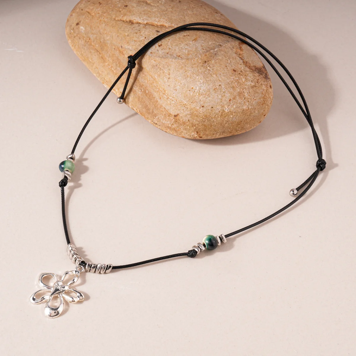 Wax rope ceramic beaded flower necklace personalized retro sweater chain light luxury item decoration