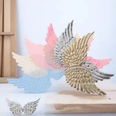 ปีกนางฟ้าตกแต่ง 12 ชิ้น: แผ่นปะติดงานฝีมือขนาดเล็กสำหรับอุปกรณ์ DIY ของประดับตกแต่งคริสต์มาส จี้รูปปีก ของประดับตกแต่งขนาดเล็ก