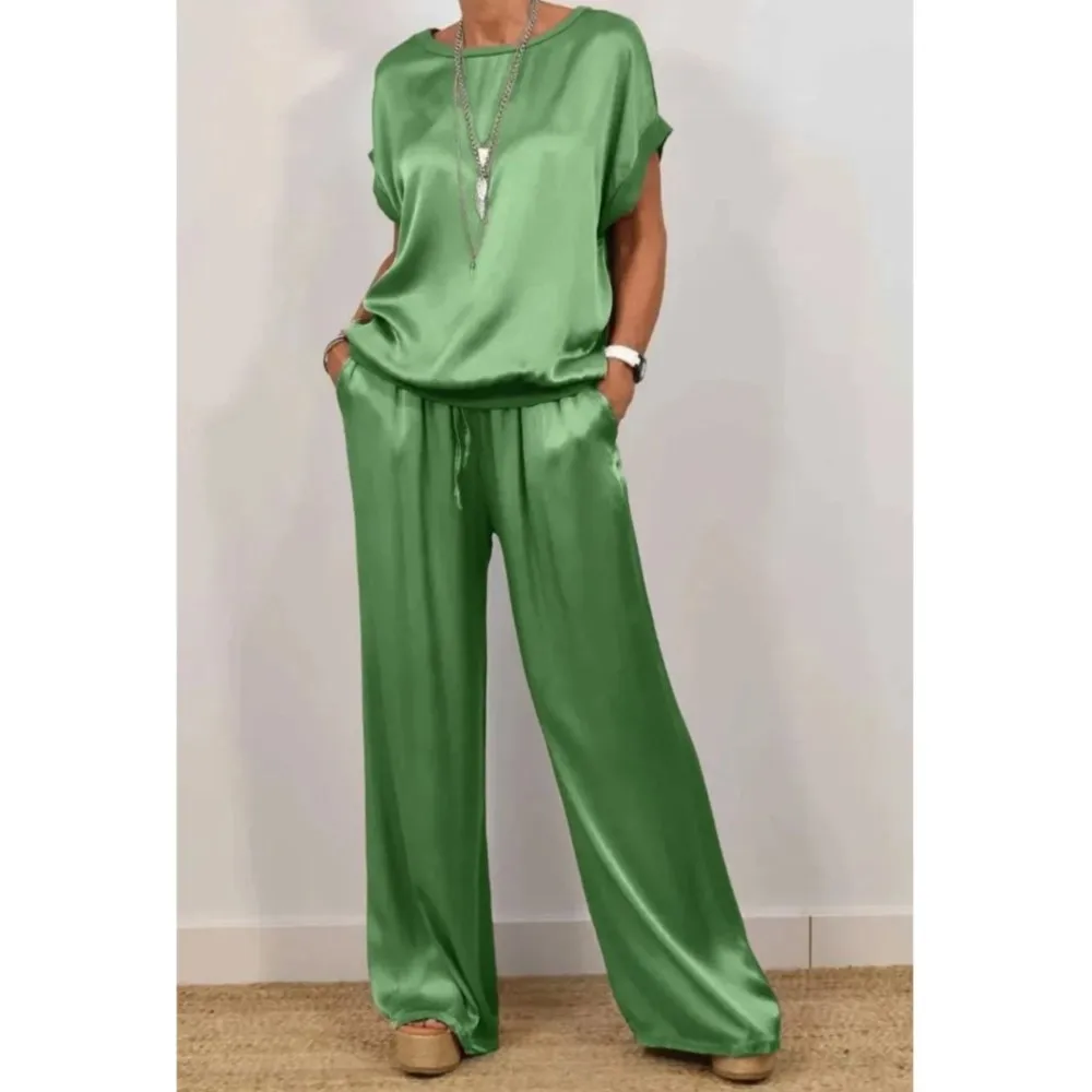 Primavera Nuovo Casual O Collo T-shirt a maniche corte Top in raso Pantaloni lunghi da donna Abito elegante femminile Pantaloni lunghi a gamba larga Set da 2 pezzi