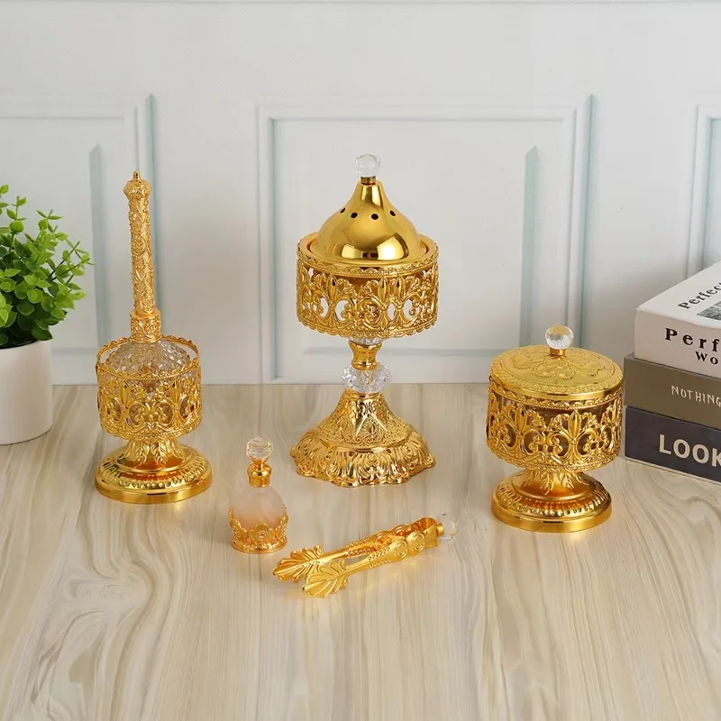 Portable aromatherapy diffuser for office, hotel or home use. Made of acrylic, it is golden in color and durable