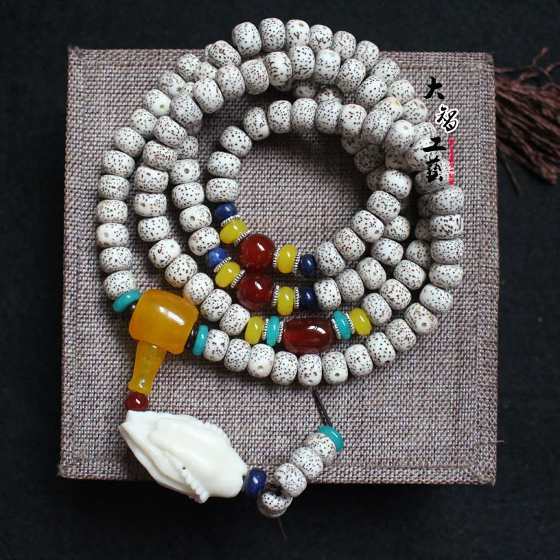 

Factory Wholesale Xingyue Bodhi Lunar January7x9Barrel beads Ivory Nut Buddha Hand Pendant Red Agate round Beads Men and Women