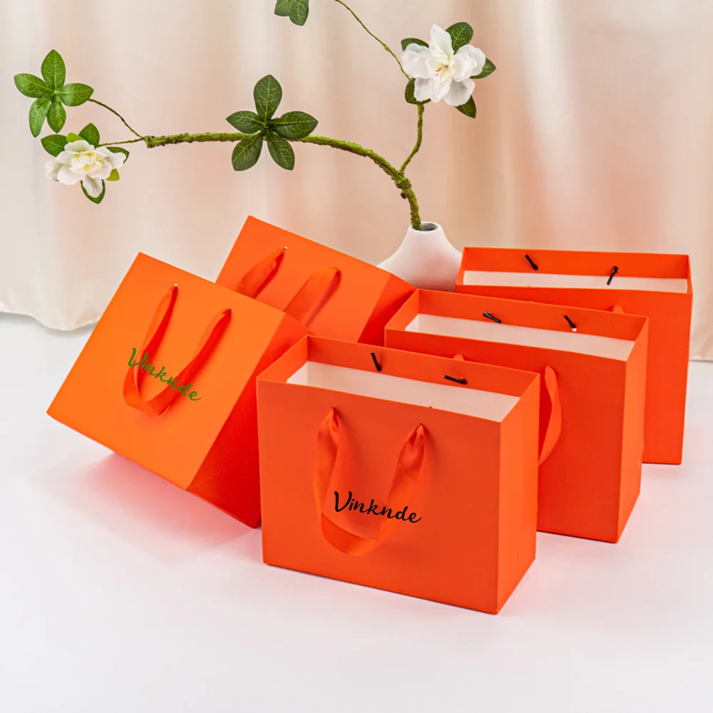 

Multiple Sizes Custom Logo Thick Orange Kraft Paper Tote Bags Clothing Packaging Bag Christmas festival Birthday Gift Wrapping