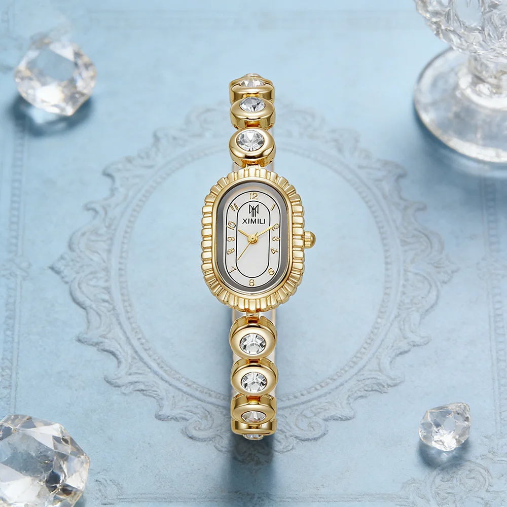 

Элегантные женские наручные часы с овальным кристаллическим браслетом, золотистого цвета, кварцевые, роскошные, для торжественных случаев.
