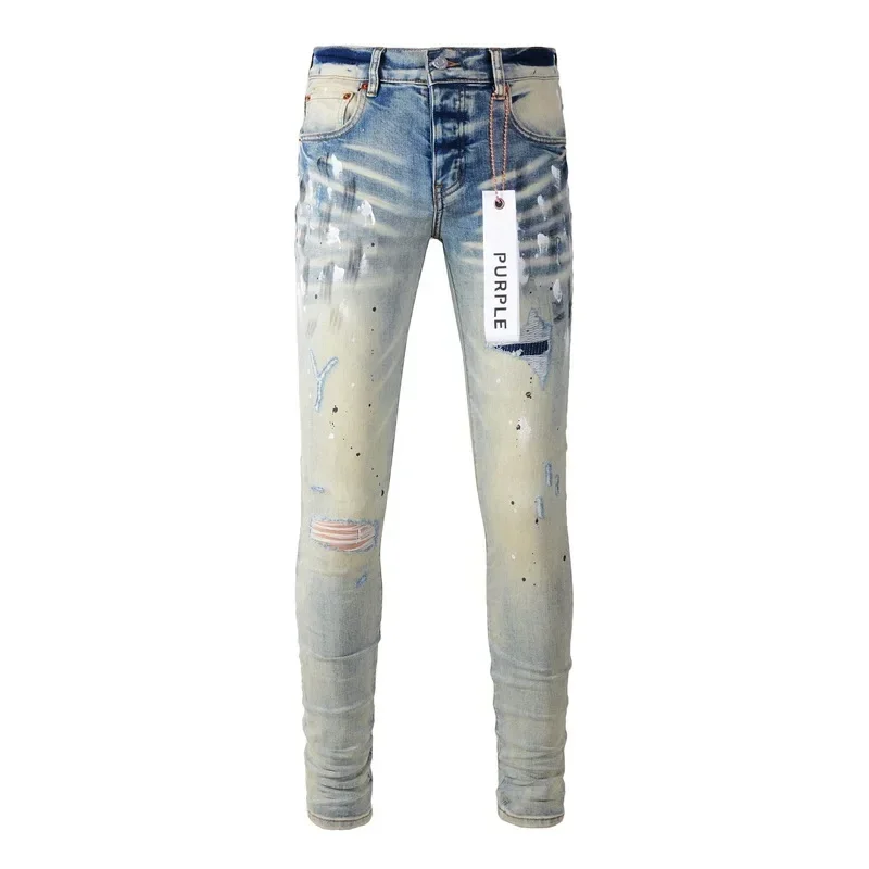 Purple branded jeans, high street paint, ripped holes, distressed repairs, low raised skinny denim trousers