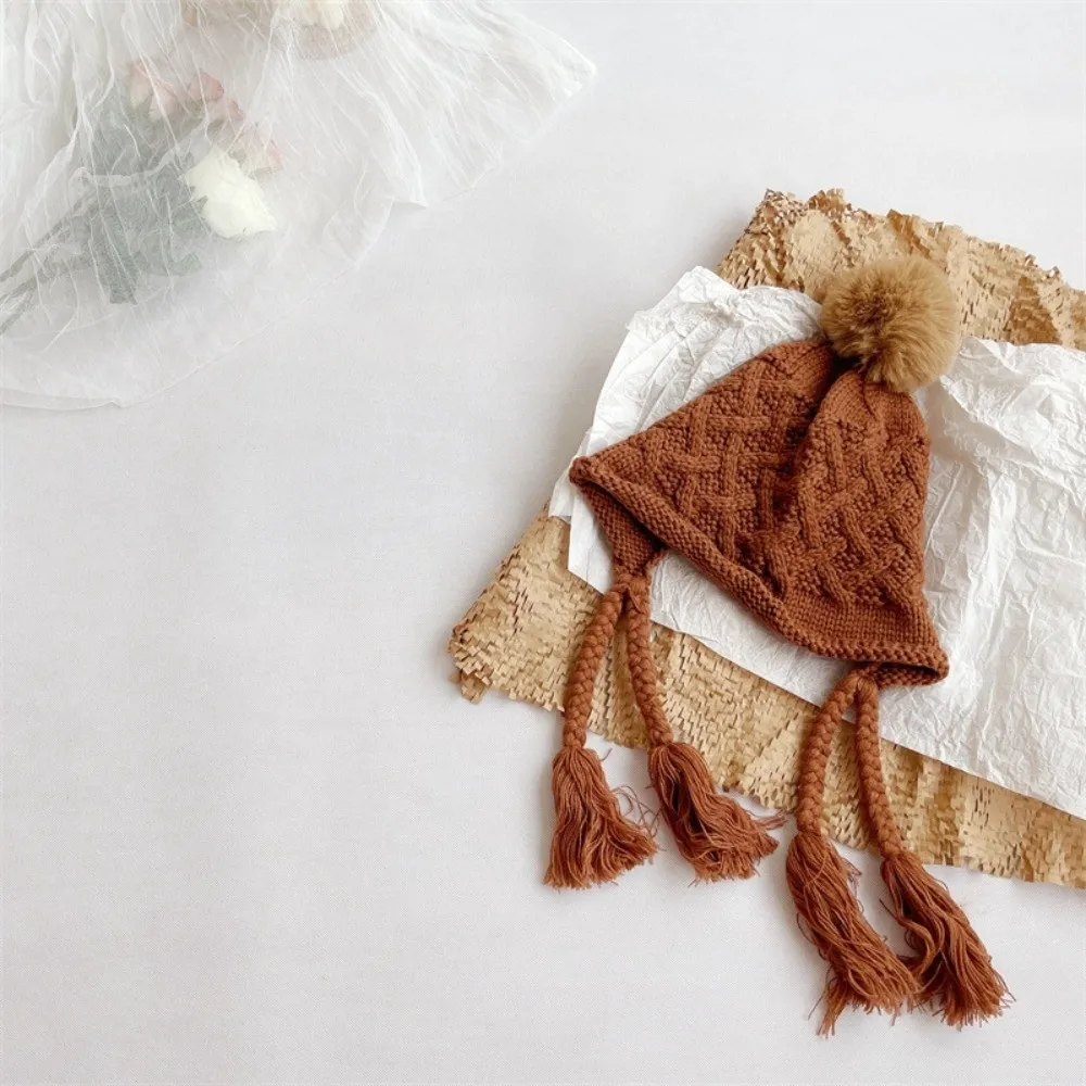 

Cute Autumn Winter Baby Crochet Hat Pom-pom Tassel Pigtail Hand Knitted Cap Soft Warm Outdoor Ear Protection Cap Toddler