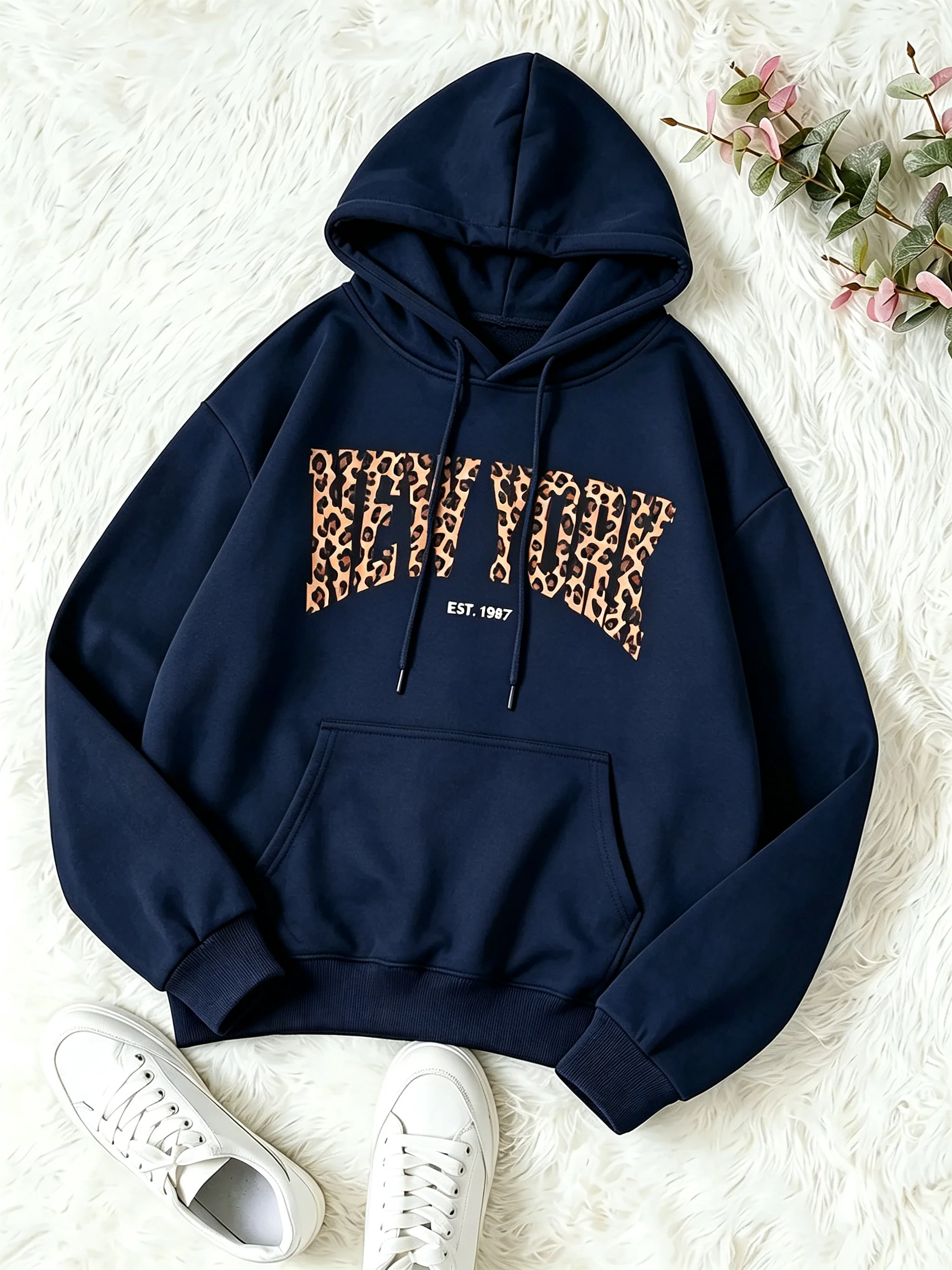 Fashionable loose-fitting pullover simple and elegant women's hoodie with printed pattern. Hoodie fashion trend  hoodies women