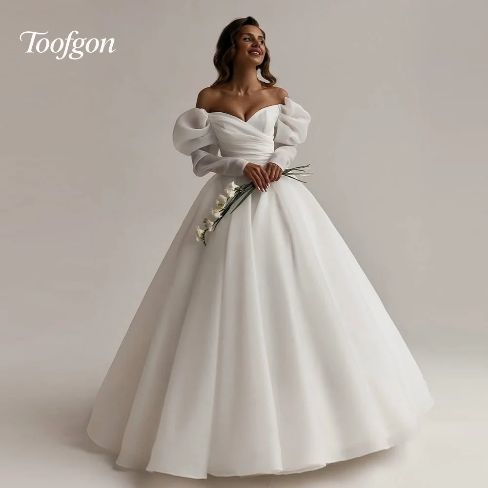 

Toofgon Princess Off Shoulder Wedding Dresses Sweetheart Long Sleeve Organza Ball Gown Luxury Corset Backless Puffy Bridal Dress