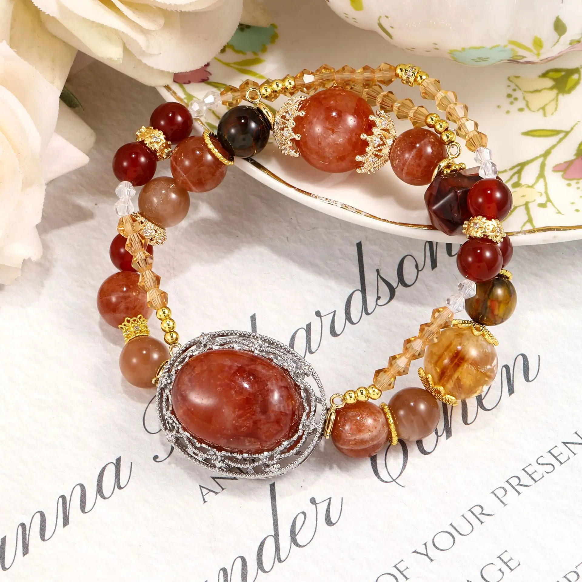 

Versatile Sakura Fire Brand Natural Orange Moonlight Sun Stone Glue Double Pointed Flower Crystal Bracelet Design Lucky Hand St