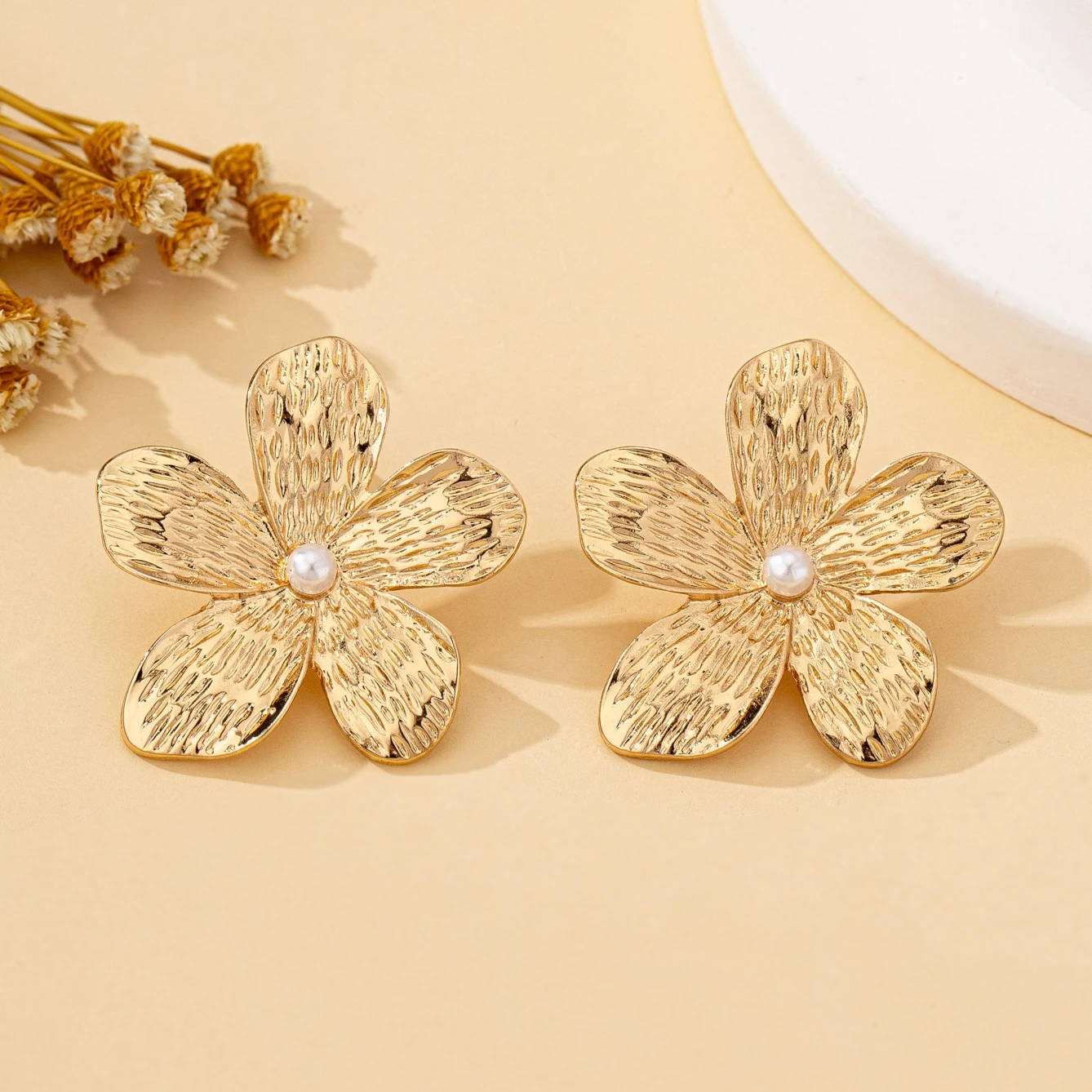 A Pair of Women's Earrings, Elegant Flower-Shaped with Flower Center Embellishments and Faux Pearl Accents, Suitable for Everyday Wear and Vacation Wear