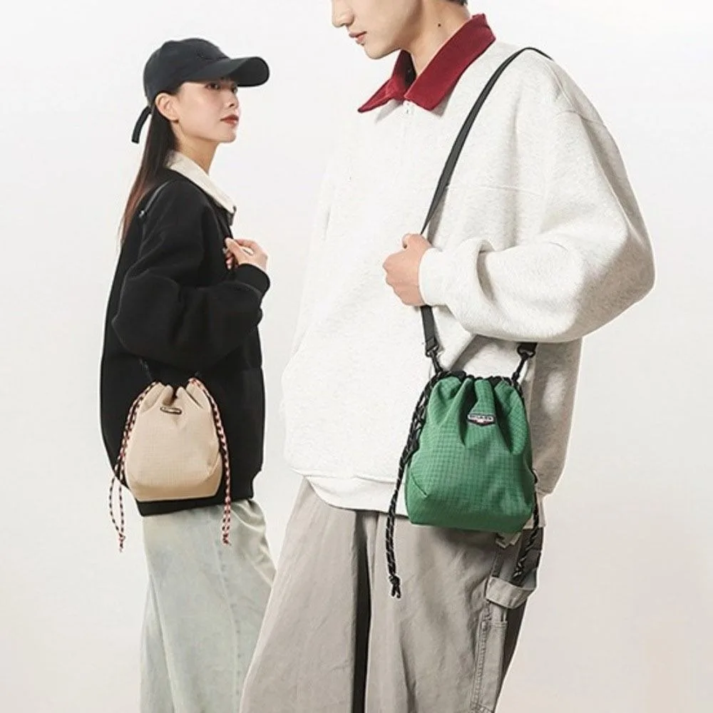 

Nylon Drawstring Bucket Bag Large Capacity Lightweight Sports Crossbody Bag Adjustable Strap Coin Purse Canvas Shoulder Bag