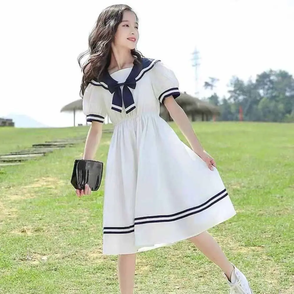 

Sweet Bow Girls Preppy Style Dress Teenagers Pleated Summer Dresses Party Beach Vacation Children Princess Dress Holiday