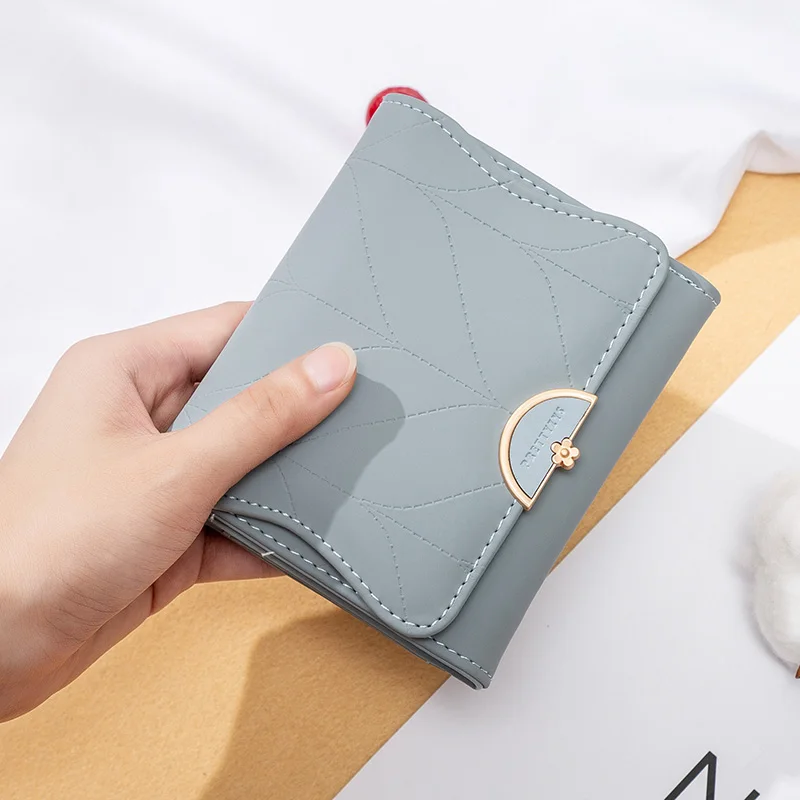 2023 new women\'s short purse Japanese and Korean PU soft hardware buckle simple trend everything niche large capacity handbag pu