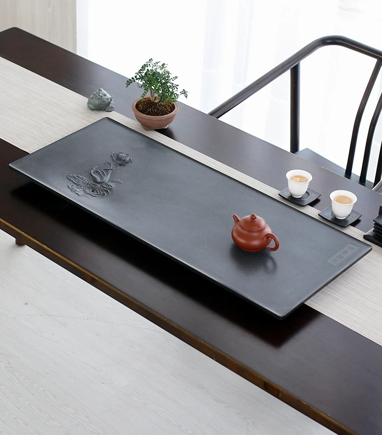 

Wujinshi tea tray, whole stone tea table, domestic natural stone, tea sea drainage, kungfu, simple tea set