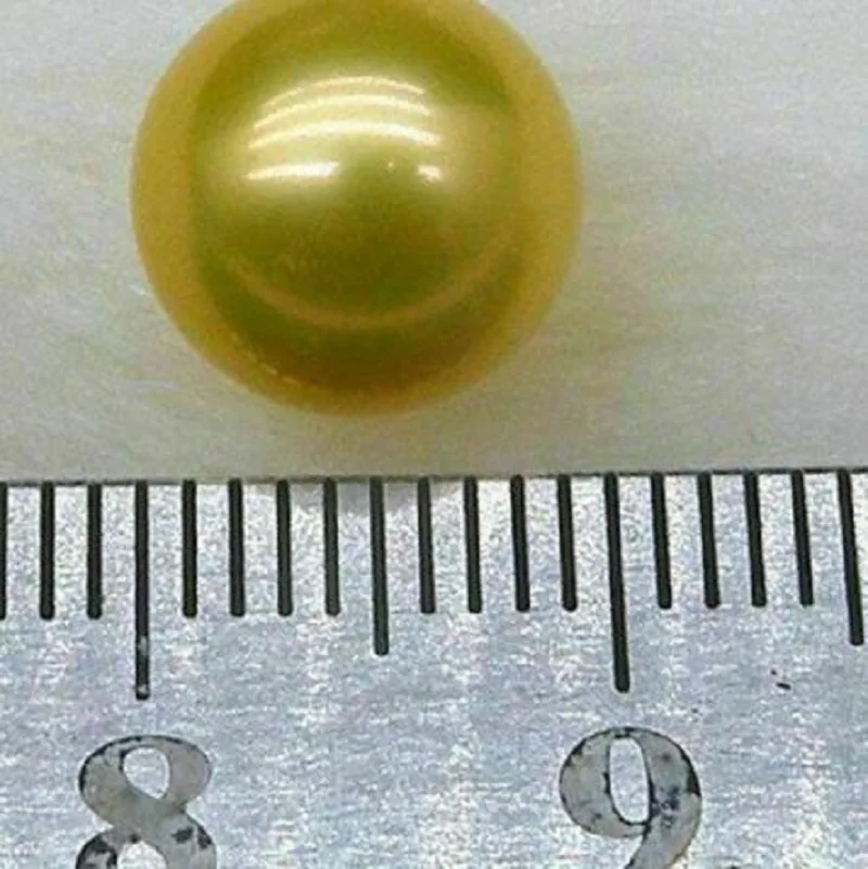 

Top AAA+++ golden yellow 7.6mm round loose south sea half drilled single pearl