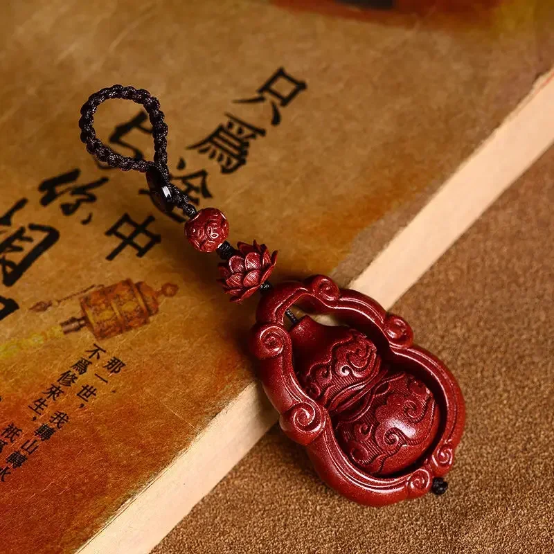 Natural cinnabar Xiangyun gourd keychain pendant for men and women this year high-end creative lotus peace car charm travel safe