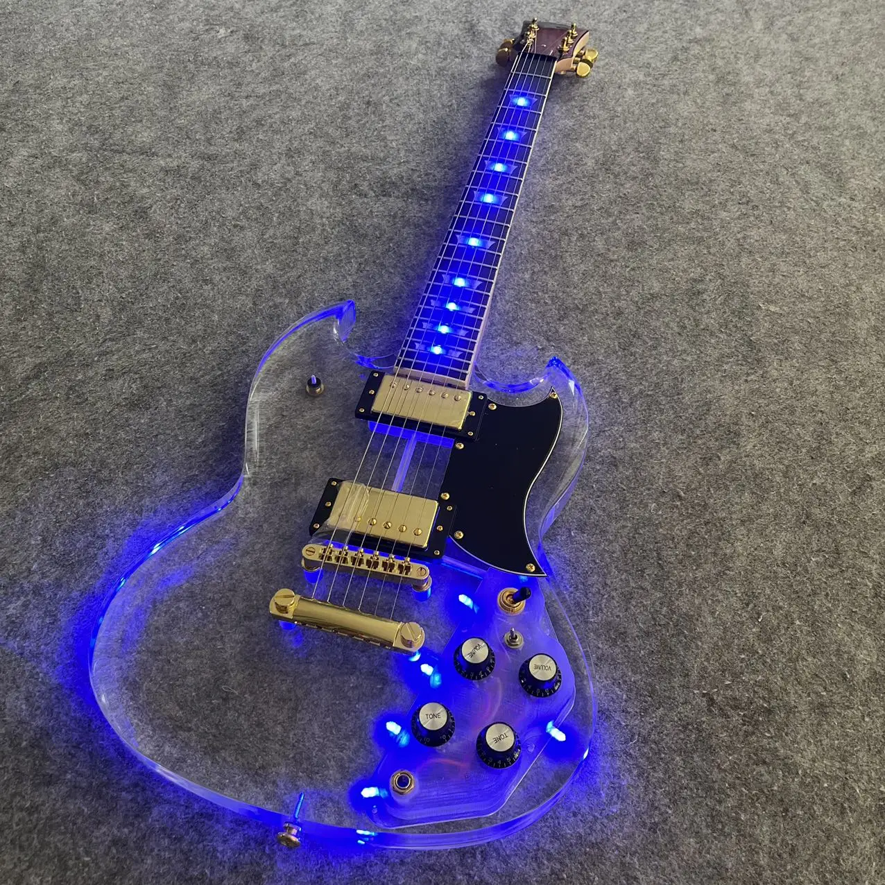 

Electric guitar, factory customized, made of maple and peach wood, acrylic, in stock, fast and free delivery ASDE