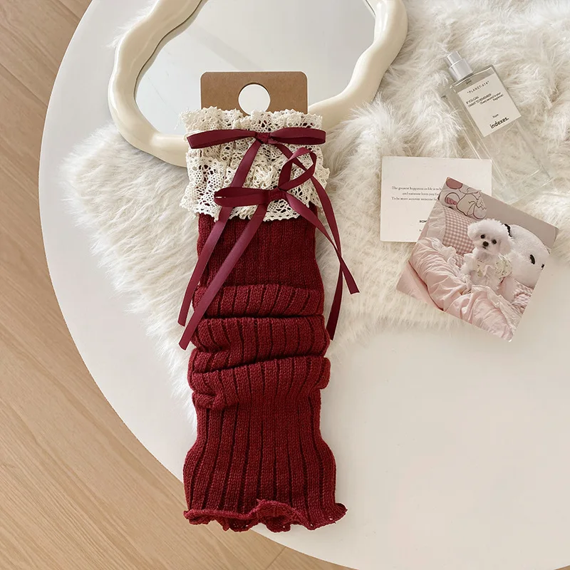 ถุงเท้าบูทแบบยาวถึงน่องสำหรับผู้หญิง ผ้าถักยืดหยุ่น อุ่นสำหรับฤดูหนาว  แบบหนา  ผ้าขนสัตว์  แบบมีโบว์ที่ข้อเท้า  สไตล์โลลิต้า