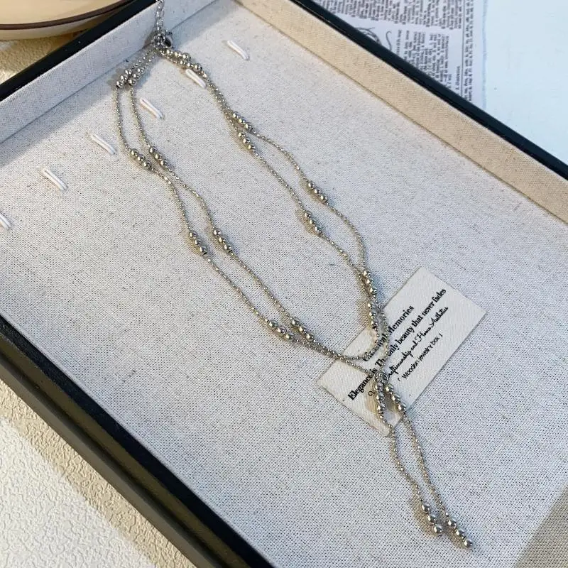 Collana di perline color argento a doppio strato Collana semplice a catena sottile Girocollo Perline rotonde Nappe Catena alla clavicola Gioielli da donna