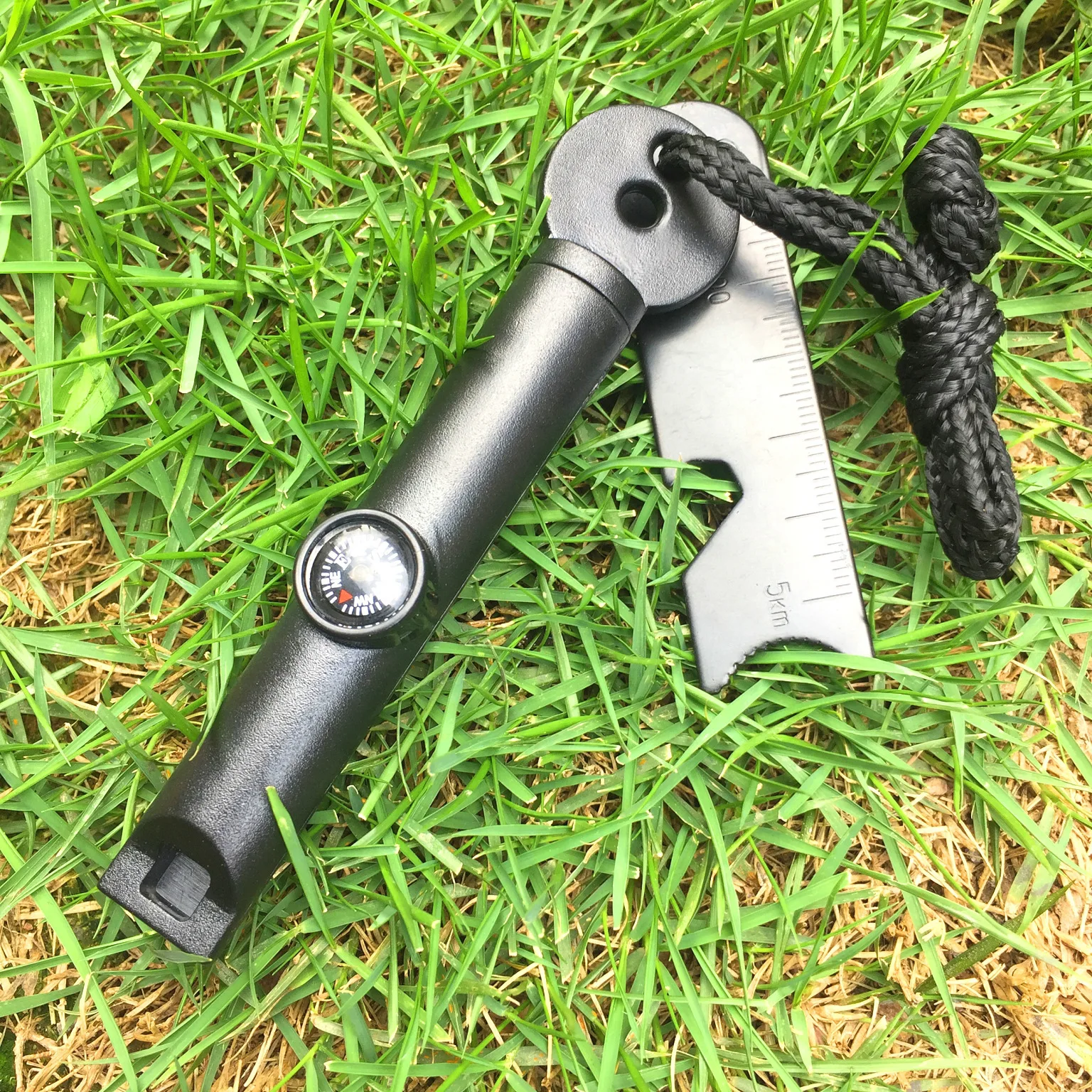

Outdoor Camping Survival EDC Tools with Whistle Compass Flint Serrated Bottle Opener Portable Ignition Stick