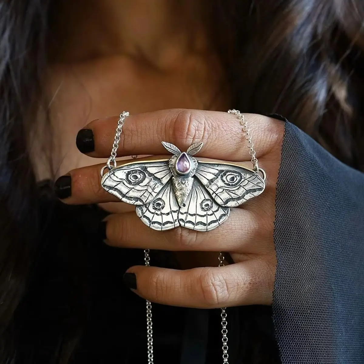 Retro-style engraved moth with artificial gemstones pendant necklace for ladies, suitable for parties and gatherings.