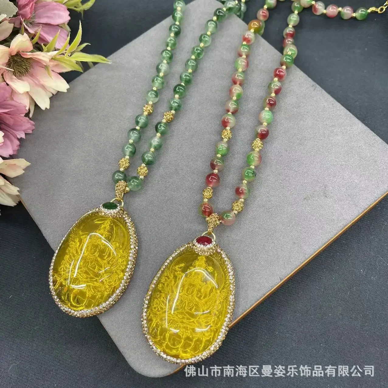 

New thousand-handed Guanyin beeswax inlaid ruby sweater chain Chinese welfare hot-selling original design