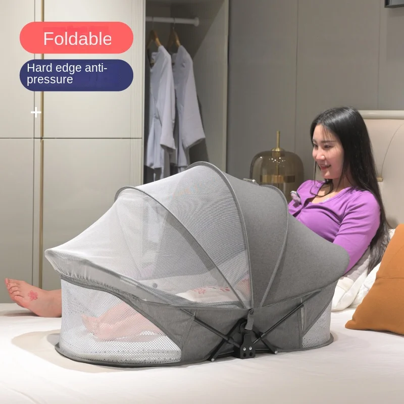 

Convenient Travel Crib: Foldable "Crib-in-Crib" with Storage Bag and Mosquito Net (80x50cm) for Babies Aged 0–1 Years