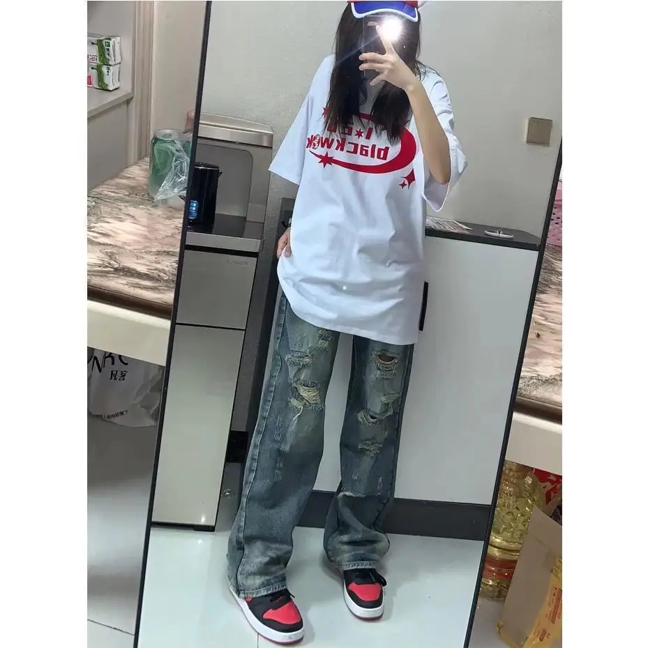 

Молодежная женская одежда, уличная одежда, палаццо, широкие драпированные жидкие женские джинсовые брюки, модные, элегантные, шикарные, модные, современные