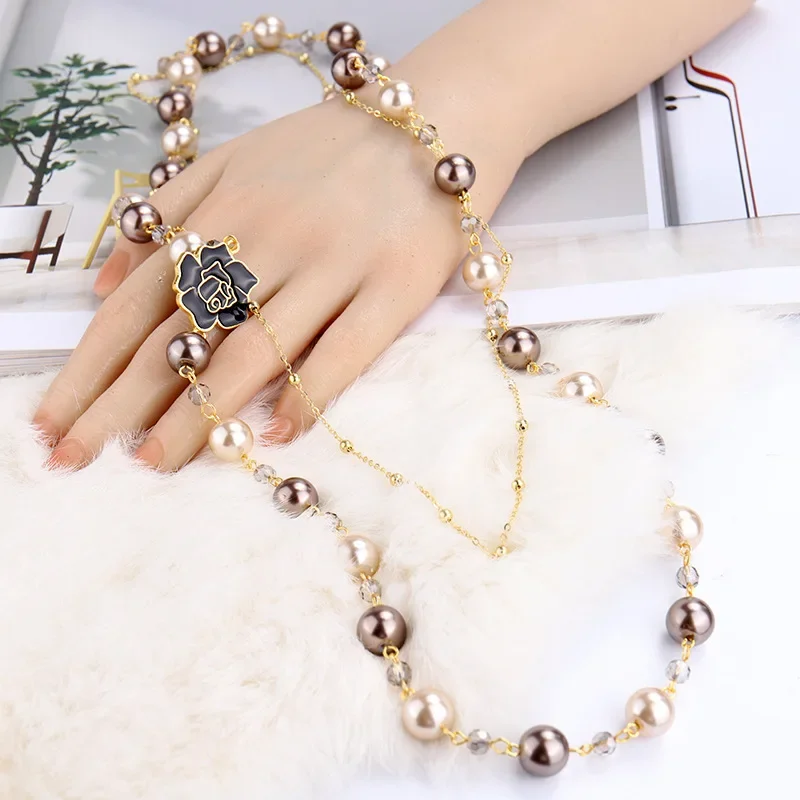 

Korean jewelry Multi layered Pearl Necklace Long Necklaces Camellia flower Neck New Sweater Chain Crystal Chain