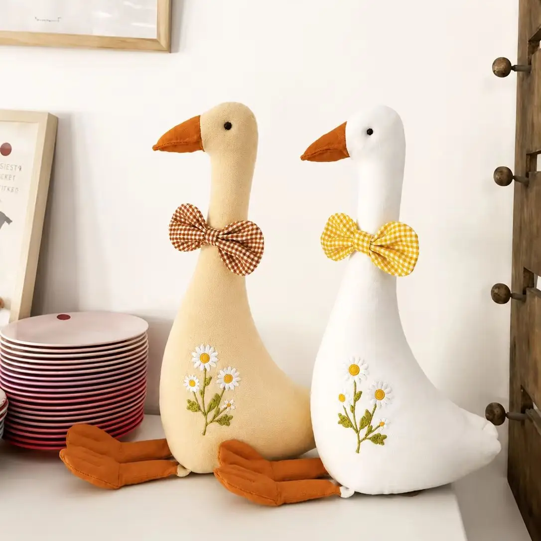 boneca-de-pelucia-vintage-em-forma-de-ganso-com-laco-vermelho-de-gingham-e-bordado-de-margaridas-brinquedo-macio-para-decoracao-de-quarto-de-bebe-presente-para-quarto-de-crianca