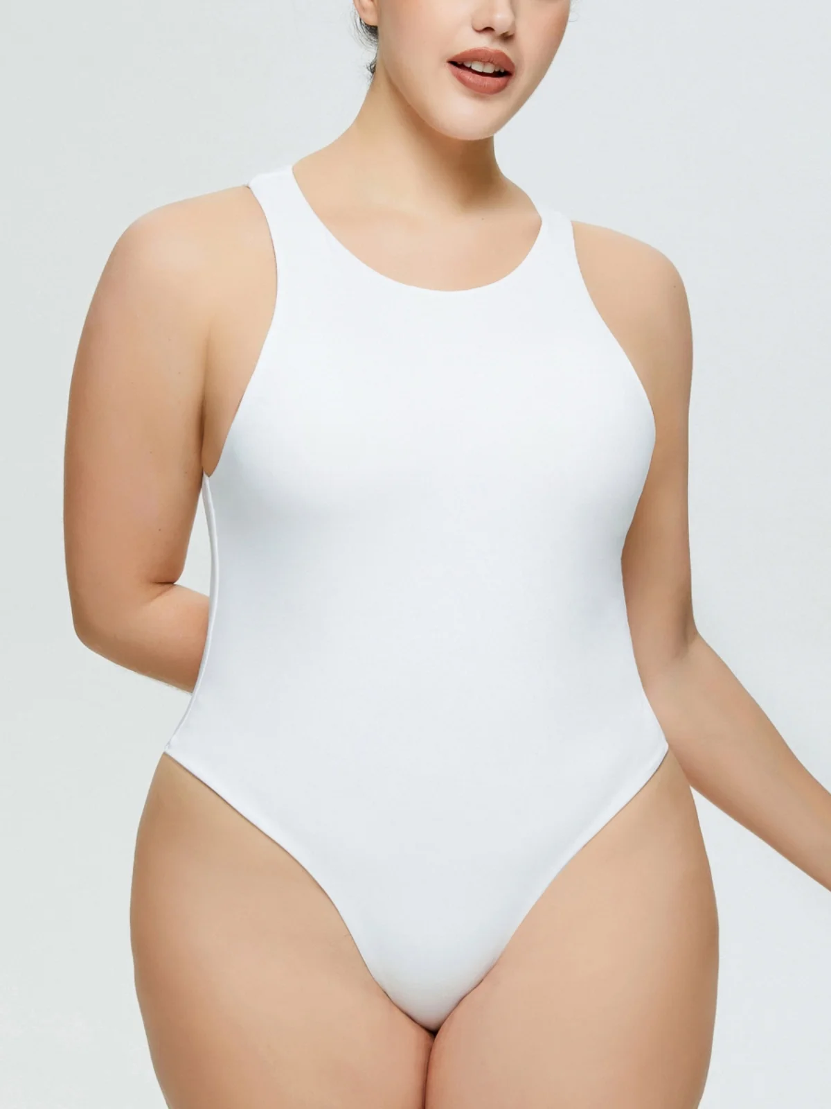 Mono de una pieza de talla ande para mujer, sin mangas, con cuello redondo triangular y plones, muy vendido para comerc...