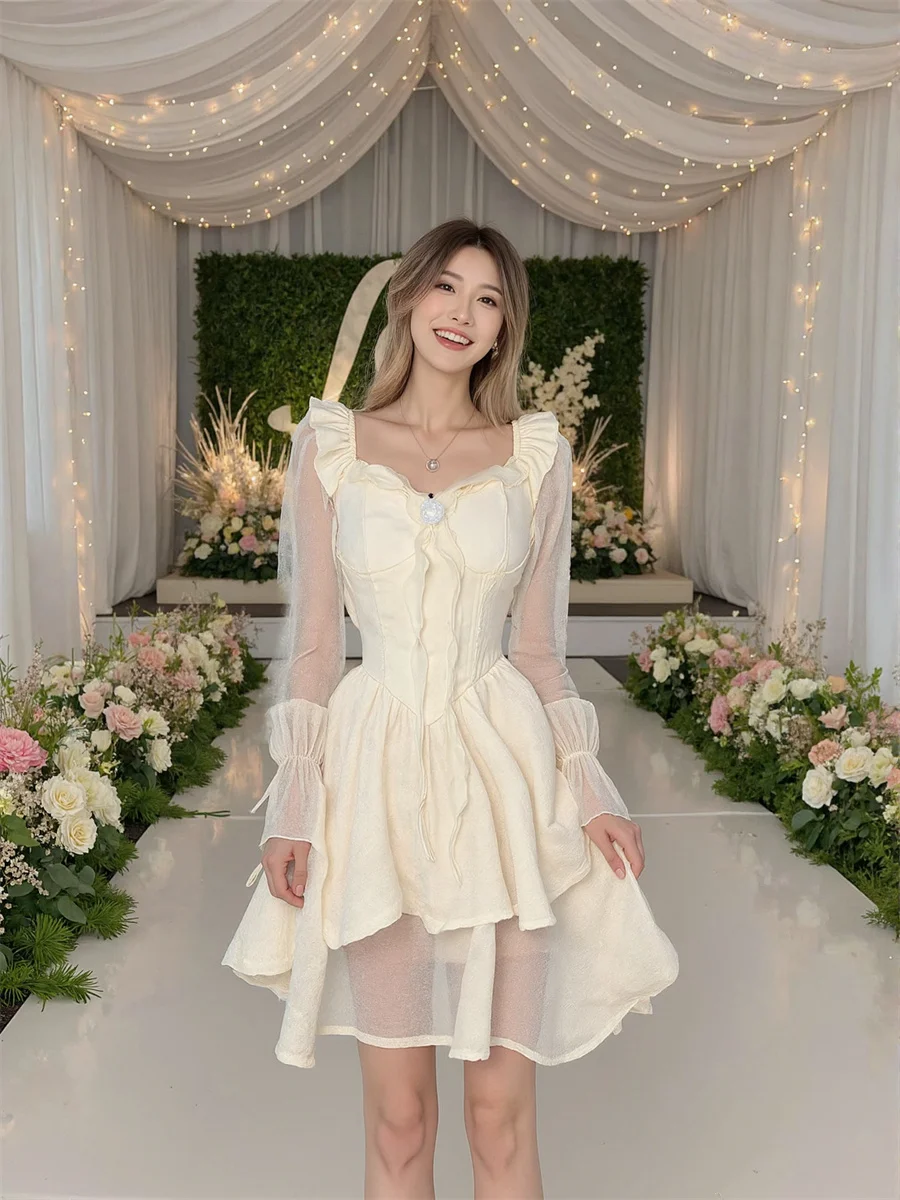 فستان نسائي أبيض بفيونكة على شكل حرف a بلون سادة وأكمام مضيئة ورقبة على شكل حرف v من التل المطرز بتفاصيل دائرية رائعة للسيدات طويلة