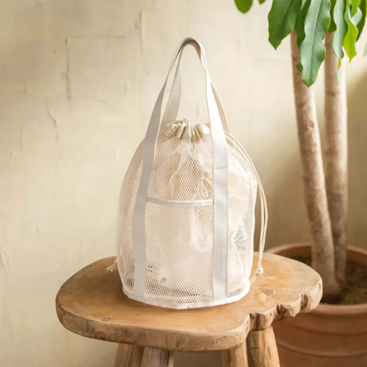 HTMCK Beige Ultra-Light Travel Toiletry Bag with Mesh Hollowed-Out Folding Design Drawstring Pocket Handbag for Beach